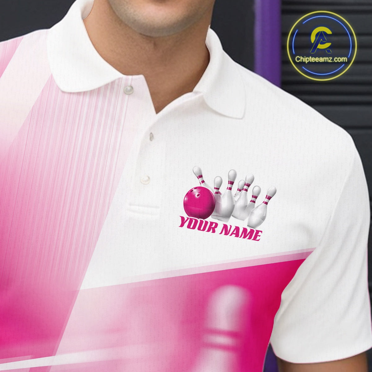 Close up left chest view of a white and pink bowling polo shirt with bowling ball and pins blended into a pink geometric pattern.
