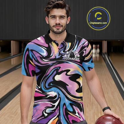 Man wearing a colorful bowling shirt with a personalized name on a bowling alley.