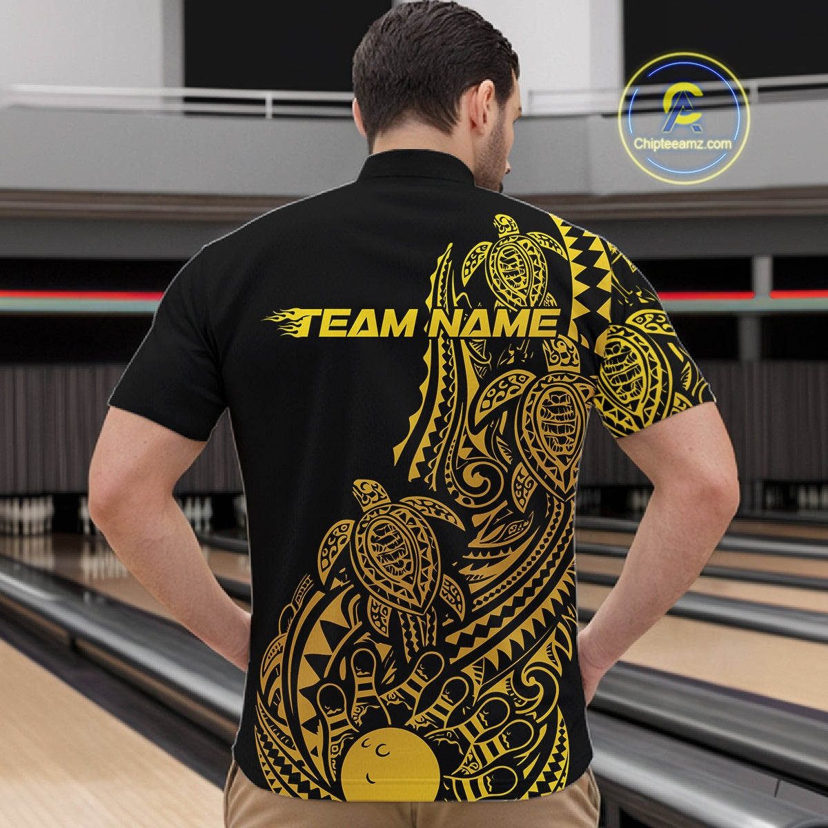 Front view of a male model in a black and gold bowling quarter-zip shirt showcasing tribal-inspired bowling motifs.