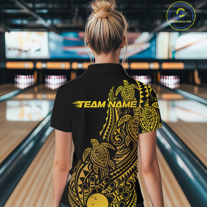 Back view of a female model in a black and gold bowling quarter-zip shirt displaying tribal bowling graphics and swirl accents.