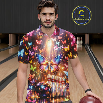 Male model wearing a bowling polo shirt at the bowling lane with colorful butterfly artwork, bowling pins, a bowling ball, and sparkling details.