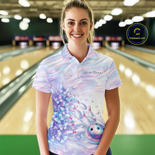 Load image into Gallery viewer, Front view of a female model in a bowling polo featuring pastel purple and pink holographic butterflies with vibrant bowling-themed artwork