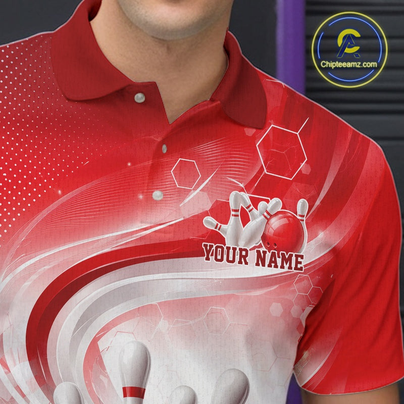 Close-up of the left chest area on a white and red bowling polo shirt with flowing wave accents and bowling pin artwork