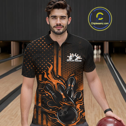 Male model at a bowling lane wearing a black and orange polo shirt with fiery bowling strike artwork and bold patriotic accents.