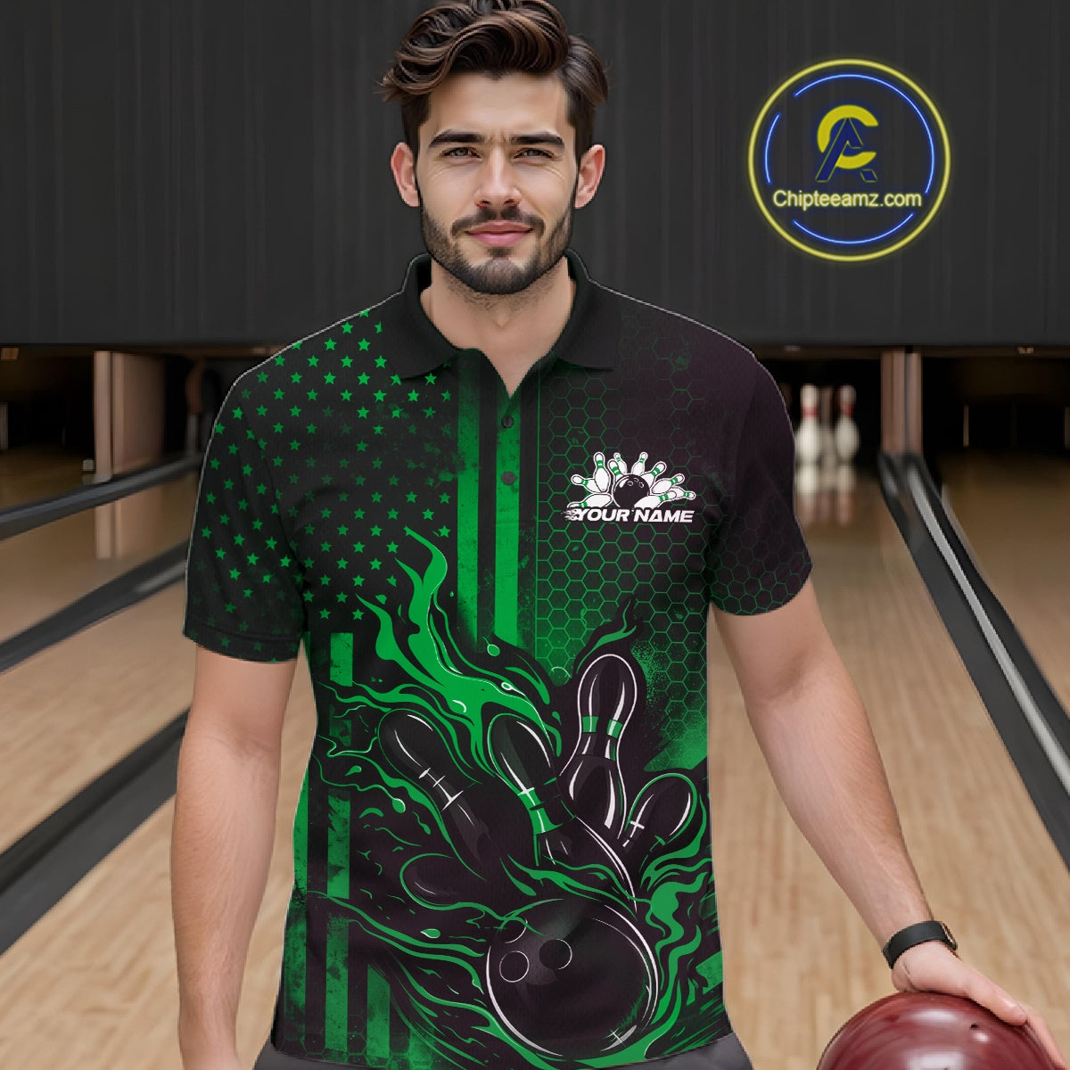Male model wearing a black and green bowling polo shirt at a bowling lane with fiery bowling strike graphics and patriotic styling.