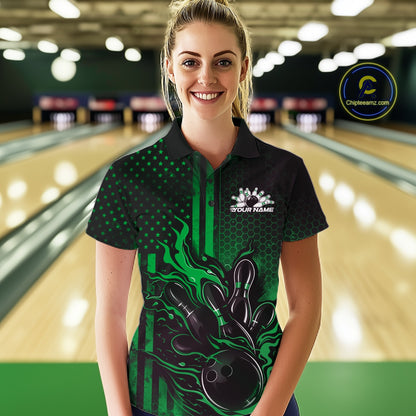 Female model wearing a black and green bowling polo shirt at a bowling lane with bold bowling strike graphics and patriotic accents.