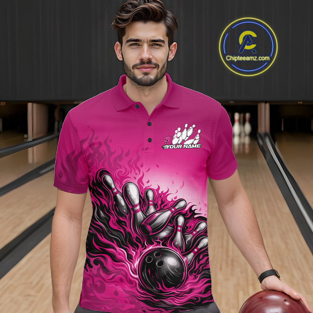 Male model in a bowling lane wearing a pink polo shirt, front view featuring flame bowling ball hitting pins artwork