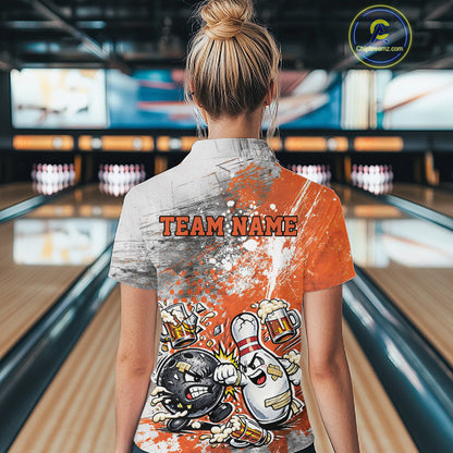 Back view of a female model in a bowling lane wearing an orange and white grunge splatter bowling quarter-zip shirt featuring playful cartoon bowling action illustration.