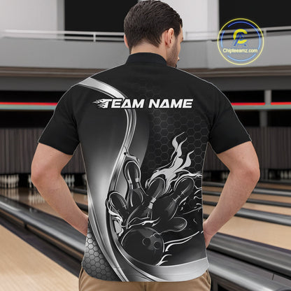 Male model front view in bowling venue wearing black and gray quarter zip shirt showcasing flaming bowling strike graphics