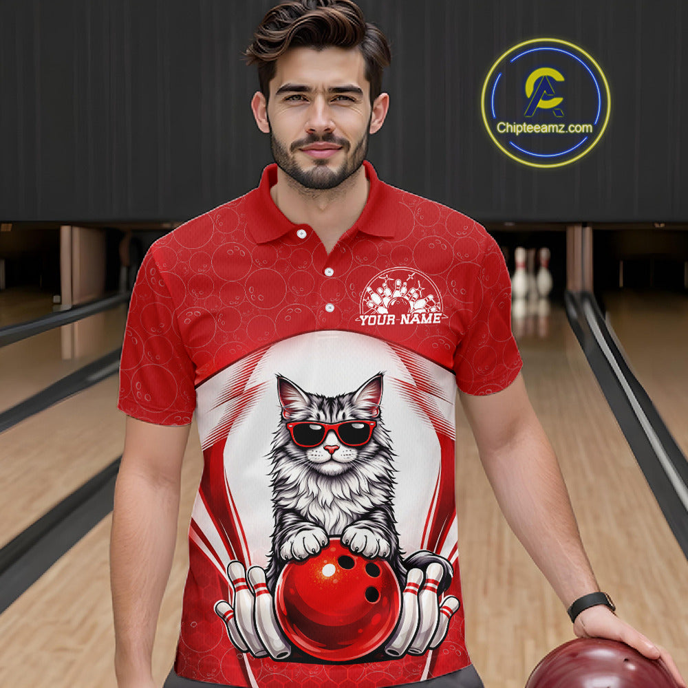 Male model at a bowling lane wearing a bowling polo shirt with a Maine Coon cat in sunglasses beside a bowling ball.