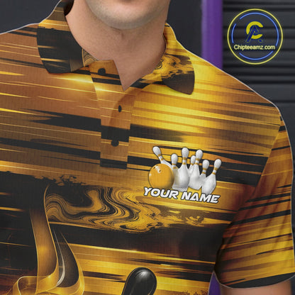 Close-up of the left chest on a bowling polo shirt showcasing glossy gold and black bowling ball and pins artwork.