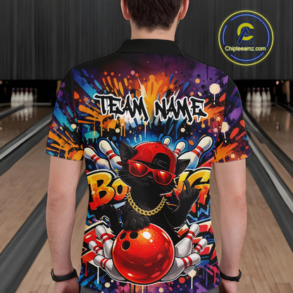 Back view of a male model in a bowling venue wearing a bowling polo shirt featuring a black cat in sunglasses leaning on a bowling ball.