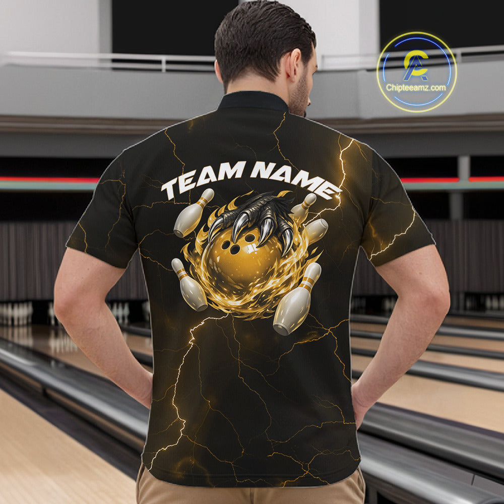 Front view of a black and yellow mens quarter-zip displaying a dragon claw holding a flaming bowling ball with scattered pins.