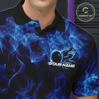 Close-up left chest detail of a blue bowling polo featuring a bowling ball encircled by flames.