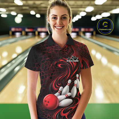 Female model wearing a black and red bowling polo shirt in a bowling alley featuring a tribal flame bowling ball and pins graphic