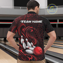Load image into Gallery viewer, Male model wearing a black and red bowling quarter-zip shirt in a bowling alley featuring a tribal flame bowling ball and pins graphic