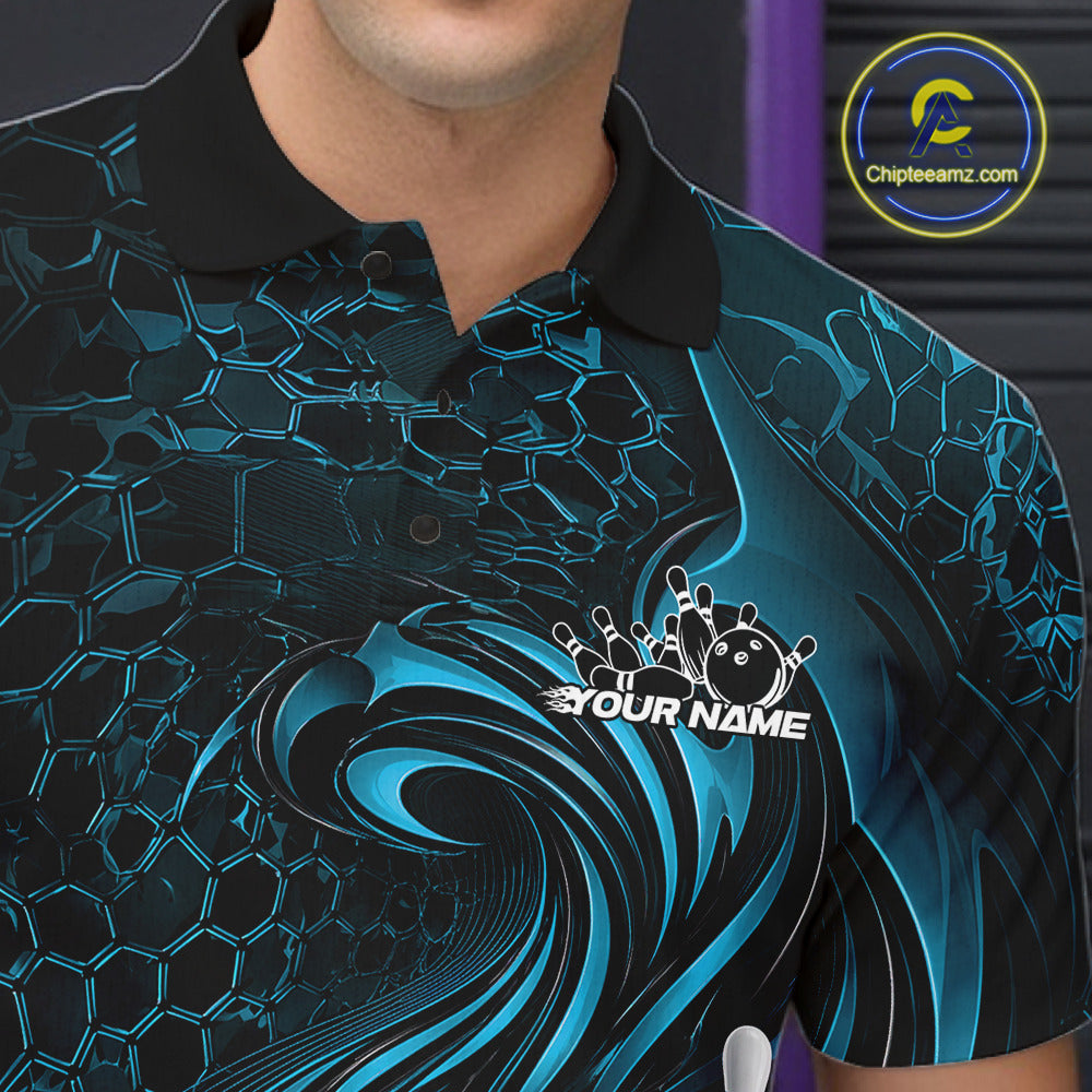 Close-up of the left chest on a black and blue bowling polo shirt featuring a tribal flame bowling ball and pins graphic
