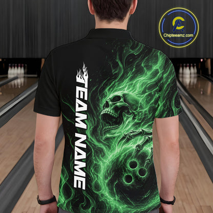 Back view of a male model wearing a black bowling polo shirt in a bowling alley featuring a skull clutching a bowling ball with swirling green energy flames