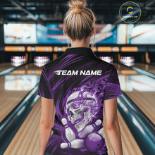 Load image into Gallery viewer, Person wearing a purple bowling shirt with a skull design in a bowling alley.