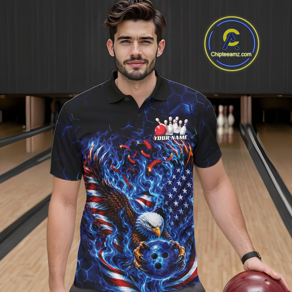 Male model front view at a bowling lane wearing a bowling polo shirt with flaming bald eagle artwork, blue bowling ball, American flag, and blue flames.