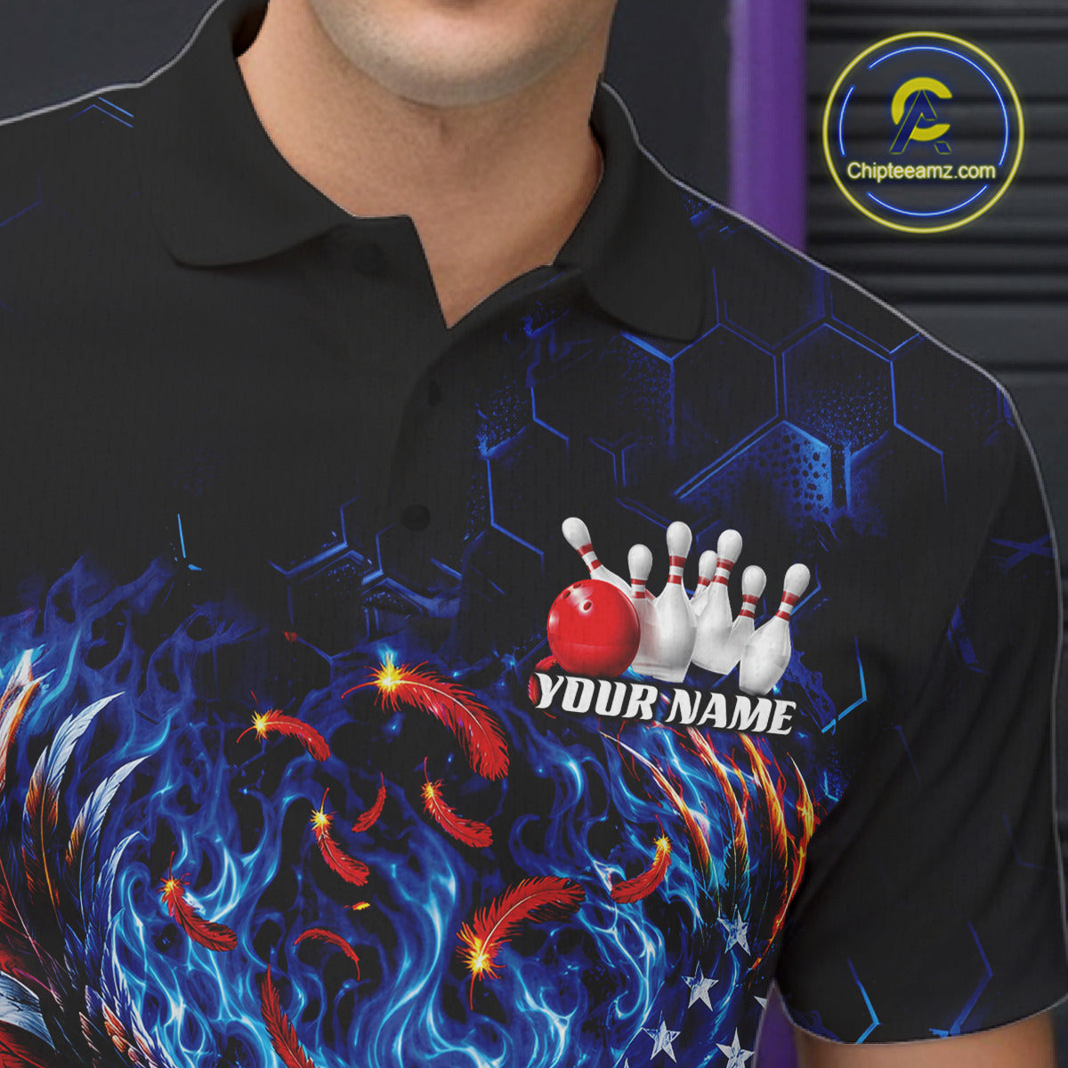 Close up of the left chest on a bowling polo shirt with flaming bald eagle artwork, blue bowling ball, American flag, and blue flames.