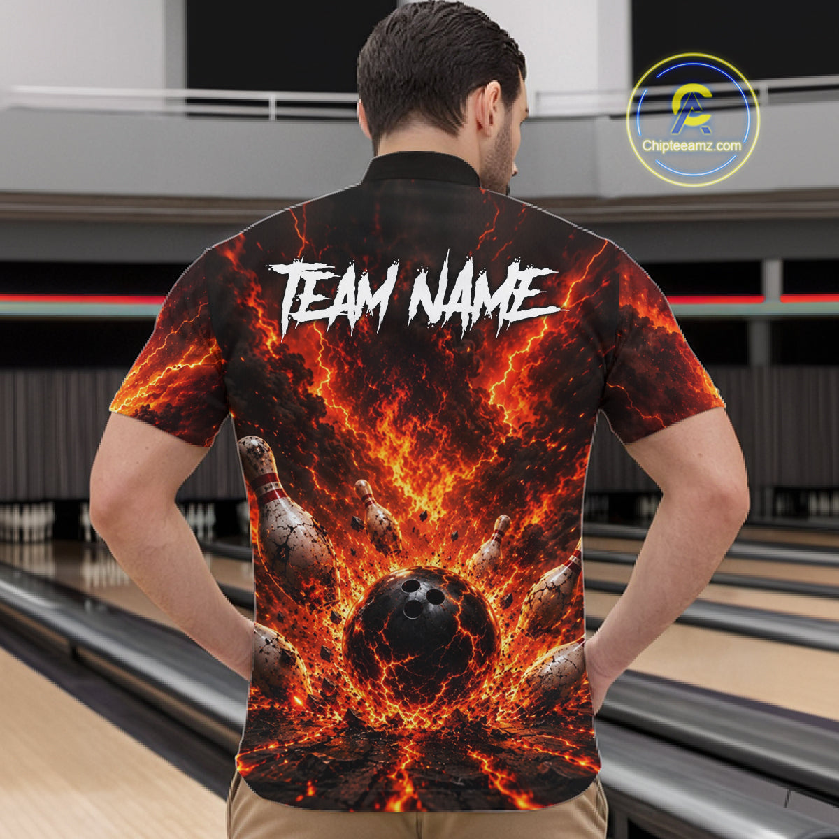 Man wearing a bowling-themed shirt with fiery design and 'TEAM NAME' text in a bowling alley.