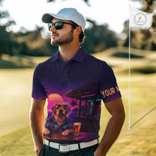 Load image into Gallery viewer, Man wearing a purple golf shirt with a dog and sunset design on a golf course.
