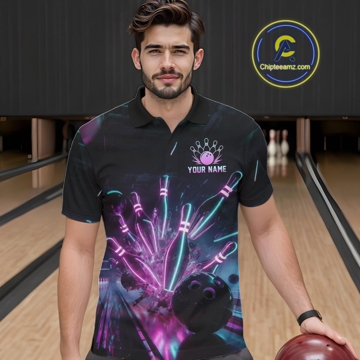 Man wearing a black bowling-themed shirt with colorful graphics in a bowling alley.