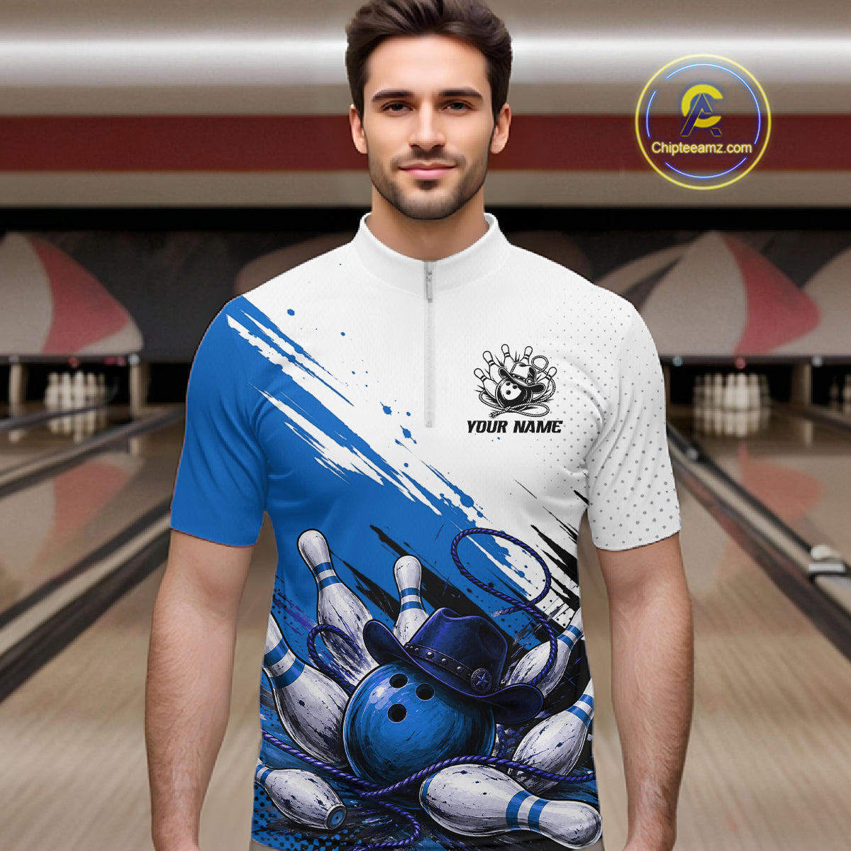 A man wearing a custom bowling-themed short-sleeve quarter-zip shirt with a blue and white graphic print of bowling pins and balls, set against a bowling alley background.