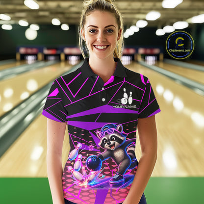 Person wearing a colorful bowling shirt with a raccoon design in a bowling alley.