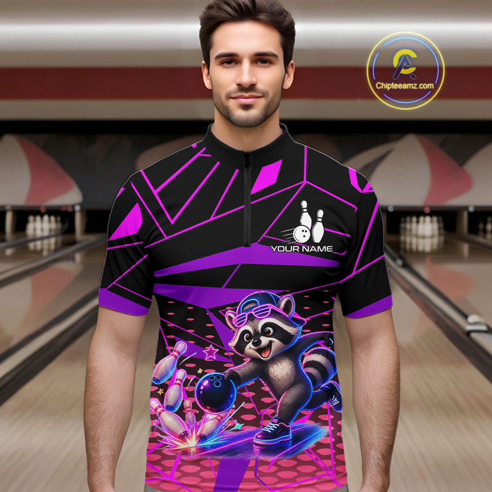 Man wearing a colorful bowling shirt with a raccoon design in a bowling alley.