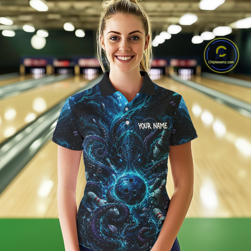 Woman wearing a blue patterned bowling shirt with 'Your Name' text in a bowling alley.