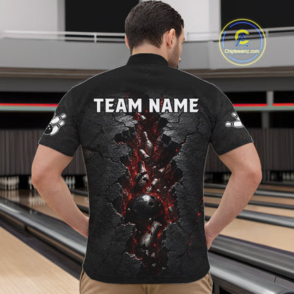 Man wearing a black bowling shirt with 'TEAM NAME' on the back in a bowling alley.
