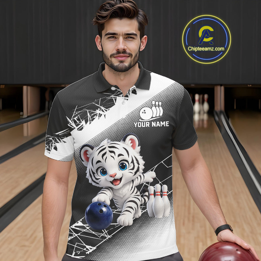 Man wearing a black and white polo shirt with a tiger design on a bowling alley.