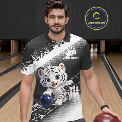 Man wearing a black and white polo shirt with a tiger design on a bowling alley.
