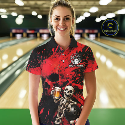 Person wearing a red and black bowling shirt with a skeleton design in a bowling alley.