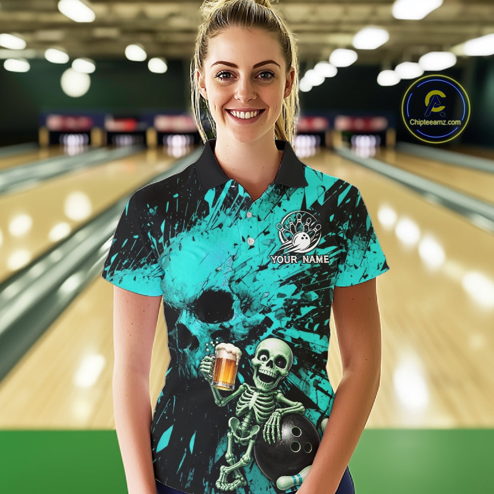 Person wearing a teal bowling shirt with a skeleton design in a bowling alley.