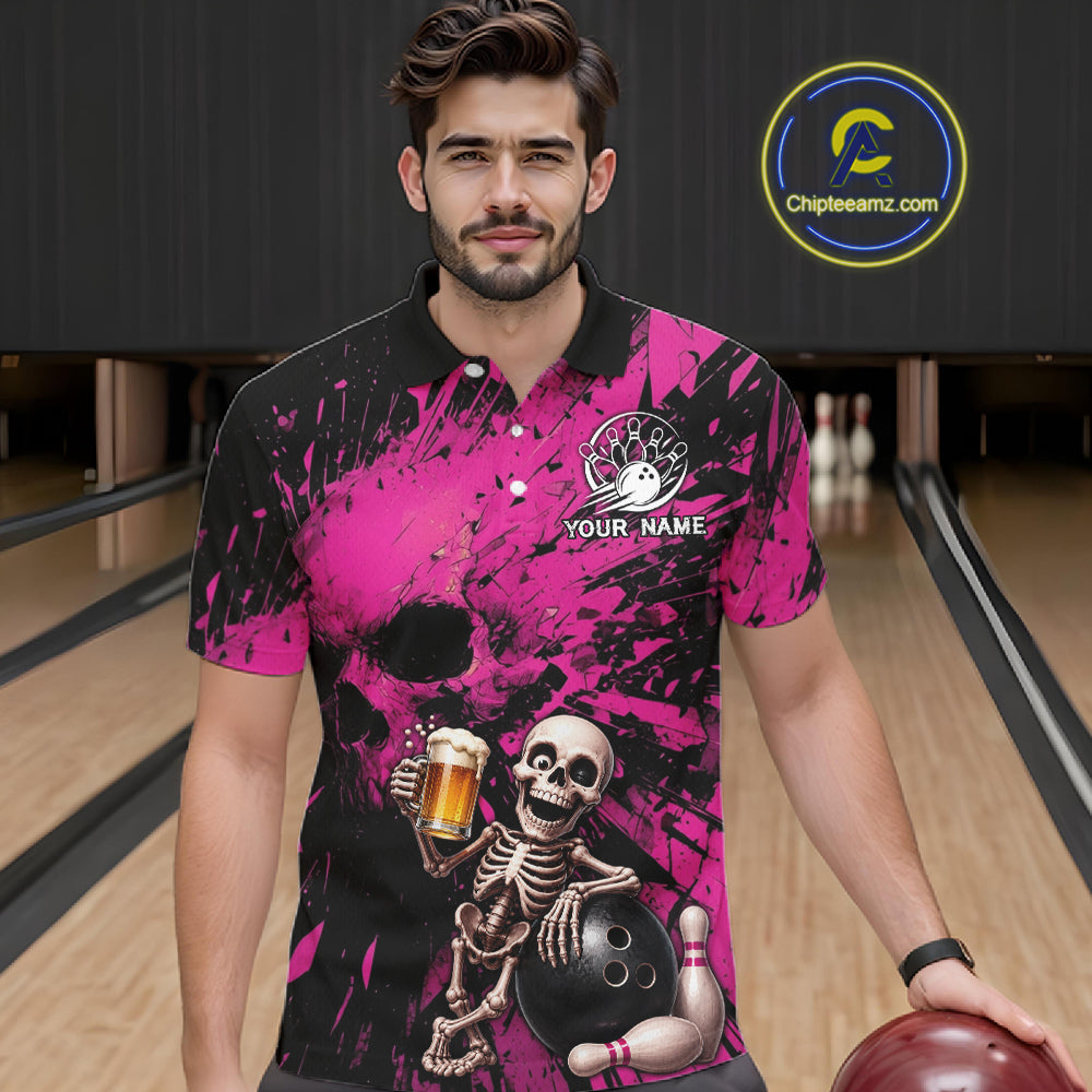 Man wearing a pink and black bowling-themed shirt with a skeleton holding a beer and bowling ball in a bowling alley.