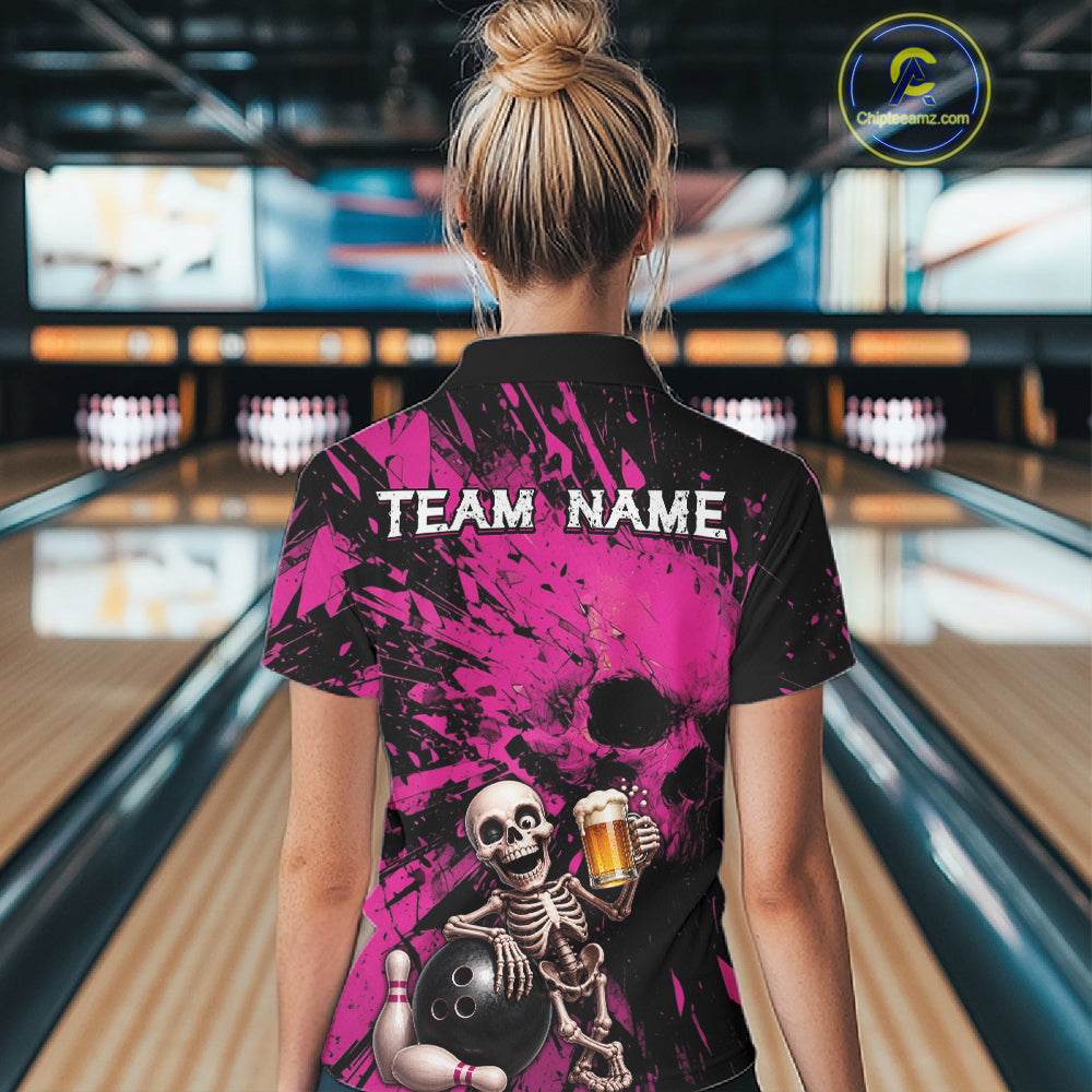 Person wearing a bowling shirt with a skeleton design and 'TEAM NAME' text in a bowling alley.