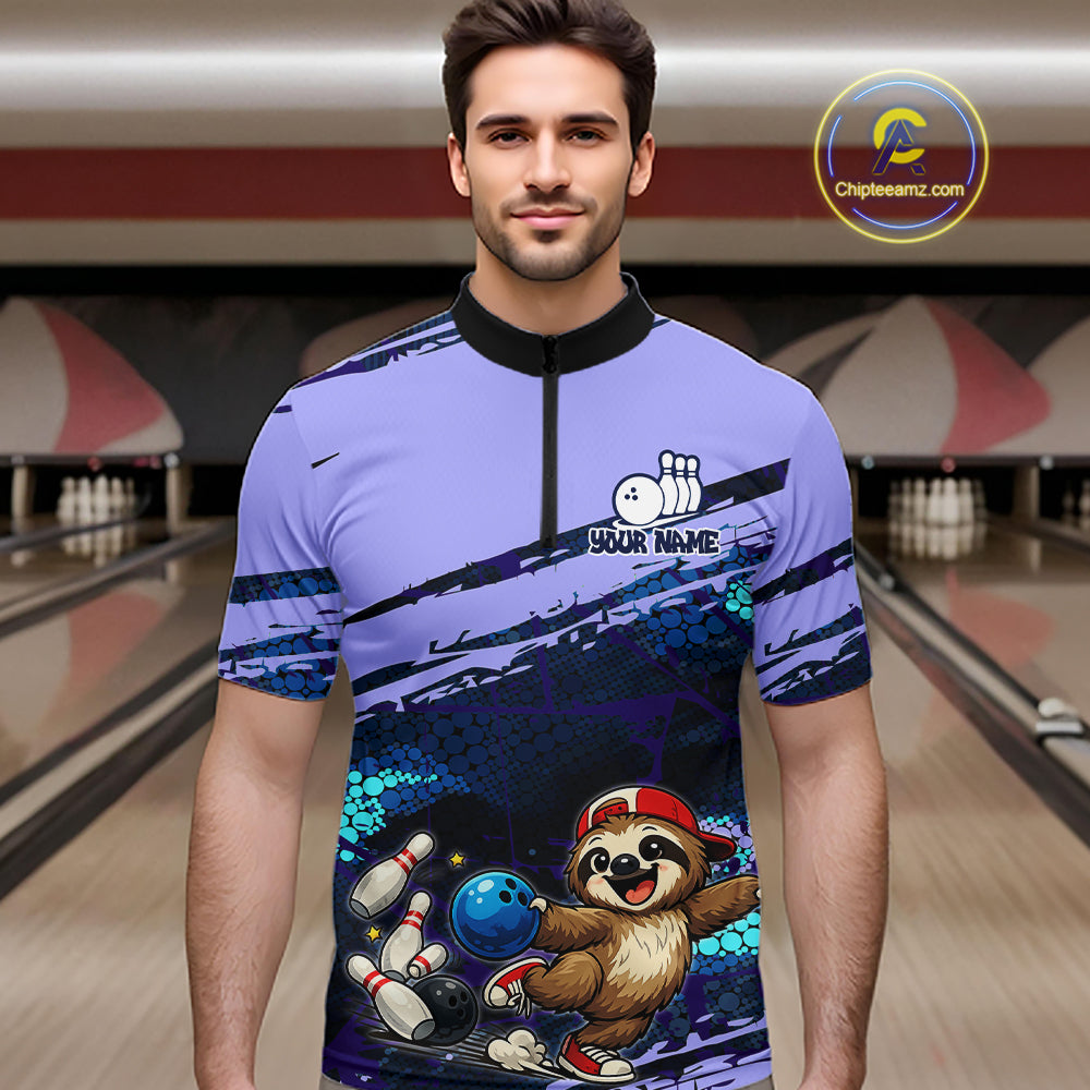 Man wearing a custom bowling shirt with a sloth holding a bowling ball design in a bowling alley.