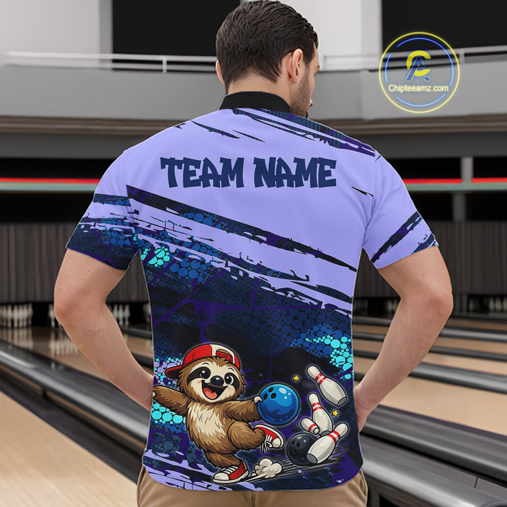 Man wearing a custom bowling shirt with a sloth holding a bowling ball design in a bowling alley.
