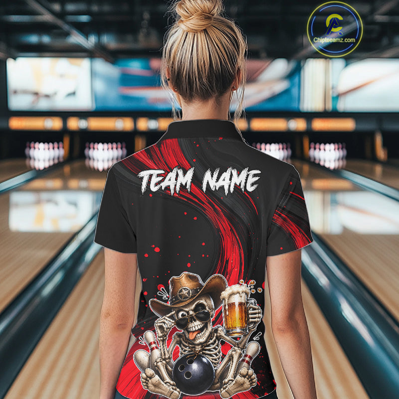 Person wearing a black bowling shirt with a skeleton design and 'Team Name' text in a bowling alley.