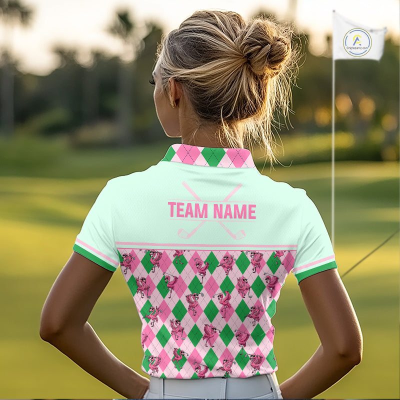 A woman viewed from behind on a golf course, wearing a short-sleeve collared shirt with a pastel mint back, pink and green argyle diamonds, and pink cactus prints across the lower back. The shirt has 'TEAM NAME' printed in pink across the upper back.