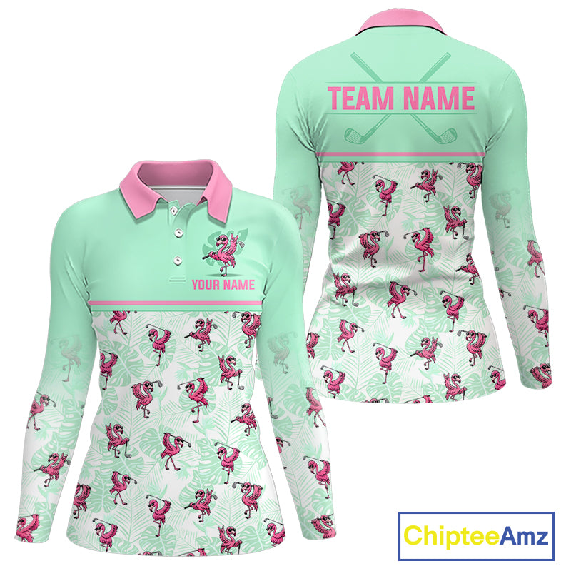 Front and back views of a long-sleeve women's polo shirt in mint green and pink, featuring a tropical flamingo print. The front has a pink collar, pink trim, and customizable text placeholders, while the back features a larger pink 'TEAM NAME' and crossed golf clubs graphic.