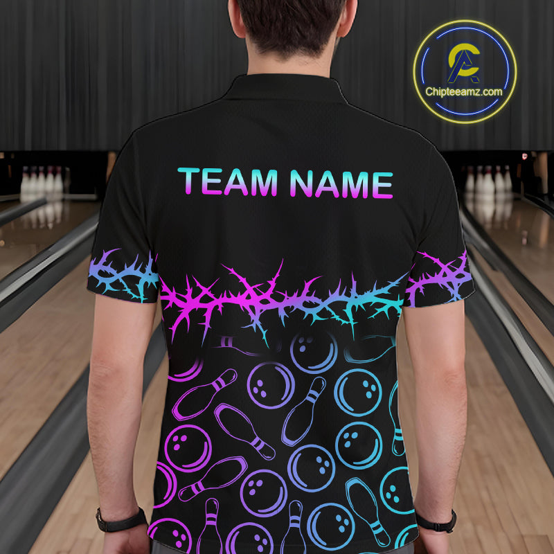 A person viewed from behind wearing a black short-sleeve bowling shirt with a colorful neon-style graphic. The shirt features the text 'TEAM NAME' in pink and blue on the upper back, a jagged decorative line across the shoulders in purple and blue, and bowling pins and bowling balls printed in purple and blue across the lower back.