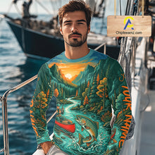 Load image into Gallery viewer, Long-sleeve shirt with nature-themed design featuring mountains, river, and fisherman, branded 'Chiptee Amz'.