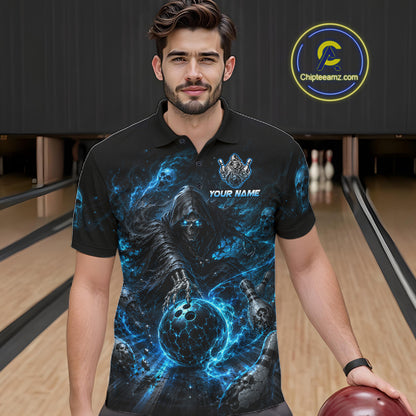 Man wearing a black polo shirt with a blue graphic design in a bowling alley.
