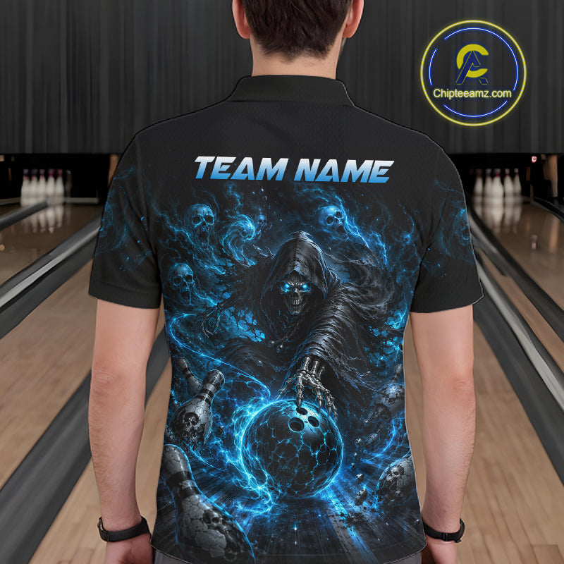 Man wearing a black polo shirt with a blue graphic design in a bowling alley.