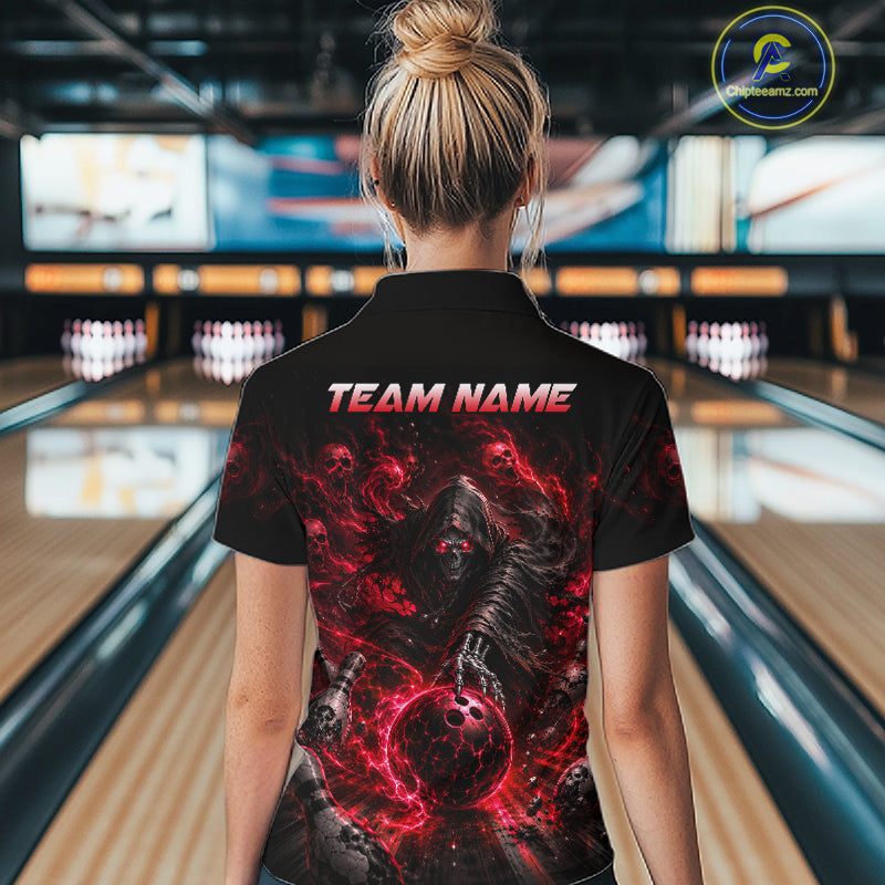 Person wearing a black t-shirt with a red and black design and 'TEAM NAME' text in a bowling alley.