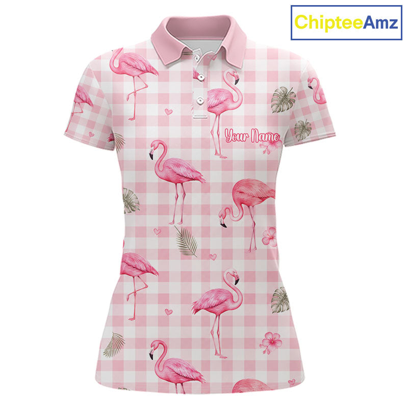 A women's short-sleeve polo shirt with a pink and white gingham check pattern, decorated with pink flamingos, palm leaves, and hearts. The shirt features a custom name placeholder 'Your Name' on the front.